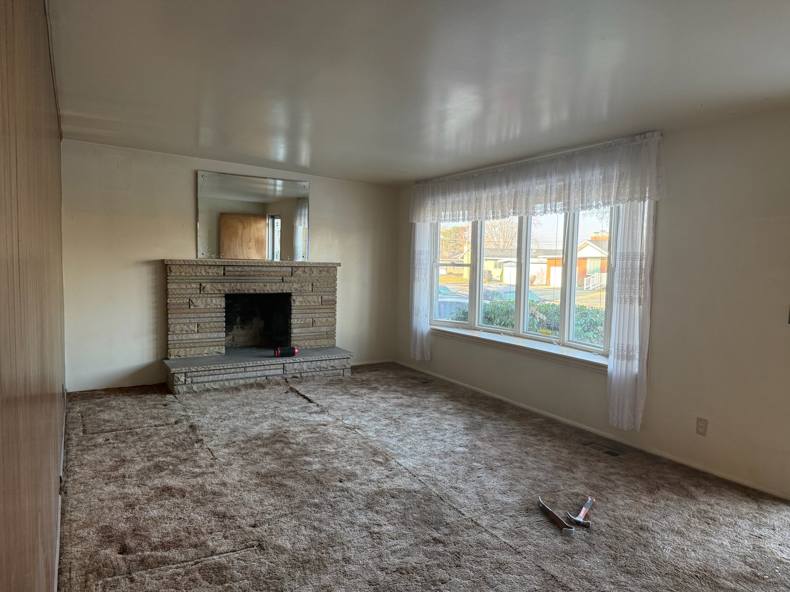 Before photo of an existing living room before a Utah County home remodeling project